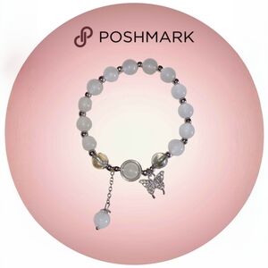 Elegant White Beaded Bracelet with Silver Butterfly Accent